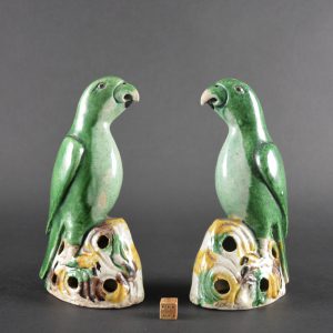 A Pair of Kangxi or Yongzheng Biscuit Porcelain Parrots