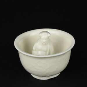 A 17th Century Blanc de Chine Porcelain Trick Cup - Robert McPherson Antiques - 26140