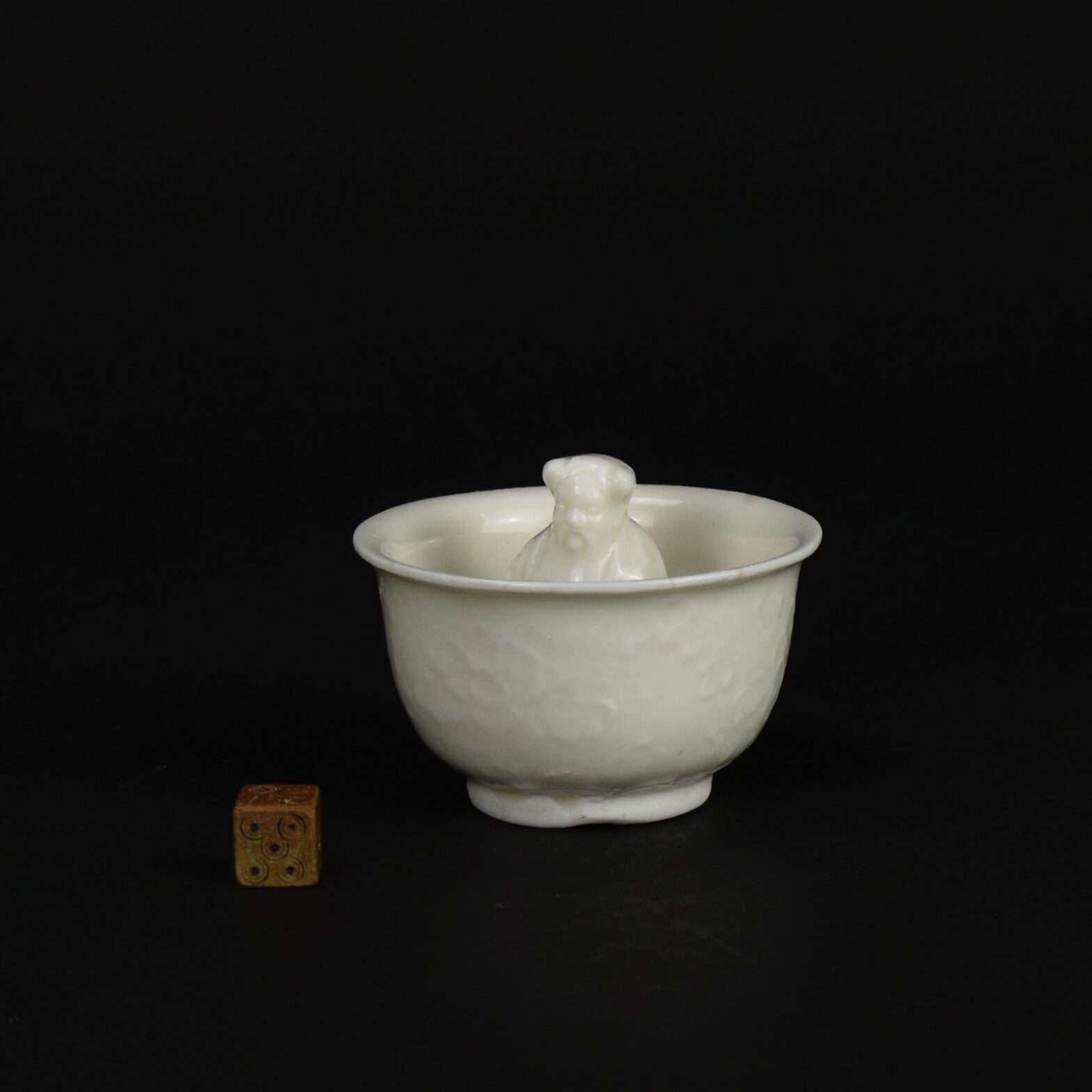 A 17th Century Blanc de Chine Porcelain Trick Cup - Robert McPherson Antiques - 26140