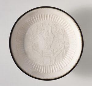 Dish (Pan) with Garden Landscape, described by LACMA as "molded stoneware with impressed decoration, transparent glaze, and banded metal rim", 13th century, diameter 5.5 in. (14 cm)