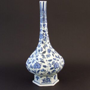 A Ming Blue and White Porcelain Vase, Jiajing Period 1522-1566. The Hexagonal Form and Meandering Scrolling Foliage with Flowers is in the Persian Style.SOLD Condition There is a slight loss to the top of the vase. Size Height : 29 cm (11 1/4 inches) Provenance N/A Stock number 23904 References For various related vases of this form as well as ewers based on this shape dated as mid-16th century see : Chinese Ceramics in the Topkapi Saray Museum Istanbul, A Complete Catalogue II, Yuan and Ming Porcelains (Regina Krahl, Sotheby`s 1986) pages 658 and 659. For a vase of this form with similar decoration dated as late 16th century see : Chinese Porcelains From The Ardebil Shrine (John Alexander Pope, Smithsonian Institute, Freer Gallery of Art, Lord Baltimore Press Inc, 1956.) page 140, plate 109, item 29.468. We would like to thank Mr Stuart Balmer for the references above. For a square vase of this type see : Exhibition of Transitional Wares for the Japanese and Domestic Markets, S.Marchant & Son, 11th - 30th June 1989, page 5, plate 3.