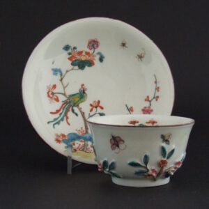 A Böttger or Early Meissen Dutch Decorated Teabowl and Saucer c.1715-1725. The White Hard-Pate Teabowl and Saucer in Imitation of Blanc de Chine or Japanese Porcelain with Three Applied Flowering Branches. Decorated in Holland c.1730 in the Kakiemon Style with an Exotic Bird (Hō-ō Bird) Sitting on a Branch of Peony Growing Through a Scholar`s Rock with Prunus to the Side.SOLD Condition There are two areas of restoration to the back of the saucer, these are almost certainly coving chips. The tea bowl is in perfect condition. Size Diameter : 12.5 cm (5 inches).