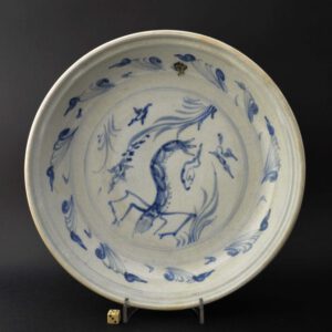 The Hoi An Hoard :The Hoi An Hoard, as has been the case with several other wrecks, was not found by archaeologists nor even by historians, but by fishermen, though happily not excavated by them. It became in fact the only commercial underwater site to have been excavated in a correct archaeological manner. It is one of the earliest cargoes (dated c. 1450-1500) to have come on to the market and to my mind is the most interesting and important of them all. Moreover, it is the only large Vietnamese cargo to have been discovered. A partnership was formed, to take charge of this landmark excavation, between the Vietnamese Government and M.A.R.E., the Maritime Archaeological Research Unit of the University of Oxford, under the Directorship of Mensun Bound, Triton Senior Research Fellow, Saint Peter’s College, Oxford. Vietnamese ceramics were not treated with the importance they deserved until very recently. Several excellent new books have now been published on the subject and an exhibition of Vietnamese Blue and White has been held at the British Museum, where objects from the Hoi An Hoard featured among the exhibits. Together with the recent excavation of the kiln sites, this cargo underlines the importance and individuality of Vietnamese ceramics. I believe that the cargo in fact contains more Vietnamese ceramics of the period than exist worldwide, taking into account not only all the museums but also all the private collections. The Hoard will be a source of research for years to come.