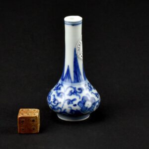 A Miniature Transitional Blue and White Porcelain Vase from the Hatcher Cargo c.1643. This miniature Chinese porcelain vase is finely painted, and a good strong cobalt blue has been used. Miniature blue and white objects, such as the present example, were very popular in the Netherlands in the 17th century. However, the cargo from the Chinese junk didn’t make it to Batavia where it would have been divided. I think these vases were made for the local South East Asian market as the fashion for miniatures in the Netherlands did not start until the latter part of the 17th century. Most of the small vases for the so-called dolls houses and for the Baroque displays found in Dutch houses are from the Kangxi period, not the end of the Ming dynasty.See below for more photographs and references. SOLD Condition In excellent condition with a very good glaze for shipwreck porcelain. Size Height 6.1 cm (2 1/3 inches) Provenance Christie's Amsterdam, June 1984. Stock number 26351 References For a group of Hatcher vases of this typ see : Fine And Important Late Ming And Transitional Porcelain, Recently Recovered from an Asian Vessel in the South China Sea. Property of Captain Michael Hatcher. Christie`s Amsterdam 14th March 1984, lots 350 to 356.