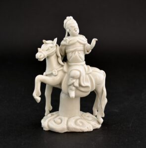 A Fine Ming Blanc de Chine Model of `Guandi God of War` on His Horse `Red Hare`, Ming Dynasty, Chongzhen Period 1628-1644. Guandi is Shown in His Armour Beneath his Robes with one Arm Outstretched and the Other Behind his Horse. They are Supported by a Pillar with Waves Issuing from the Base.SOLD Condition Very good, minor losses including the end of one of 'Red Hare's' ears. Size Height : 12 cm (4 3/4 inches) Provenance N/A Stock number 242591 References For a very similar but larger (21 cm) Ming Blanc de Chine Porcelain group see : Blanc de Chine (Introduction by John Ayers, S.Marchant & Son, 2006. ISBN 0-9554009-0-2) page 42, plate 21. For another Blanc de Chine figure of this type dated to the 17th Century see : Blanc de Chine, Divine Images in Porcelain (John Ayres, China Institute Gallery, New York, 2002) page 96, plate 47.