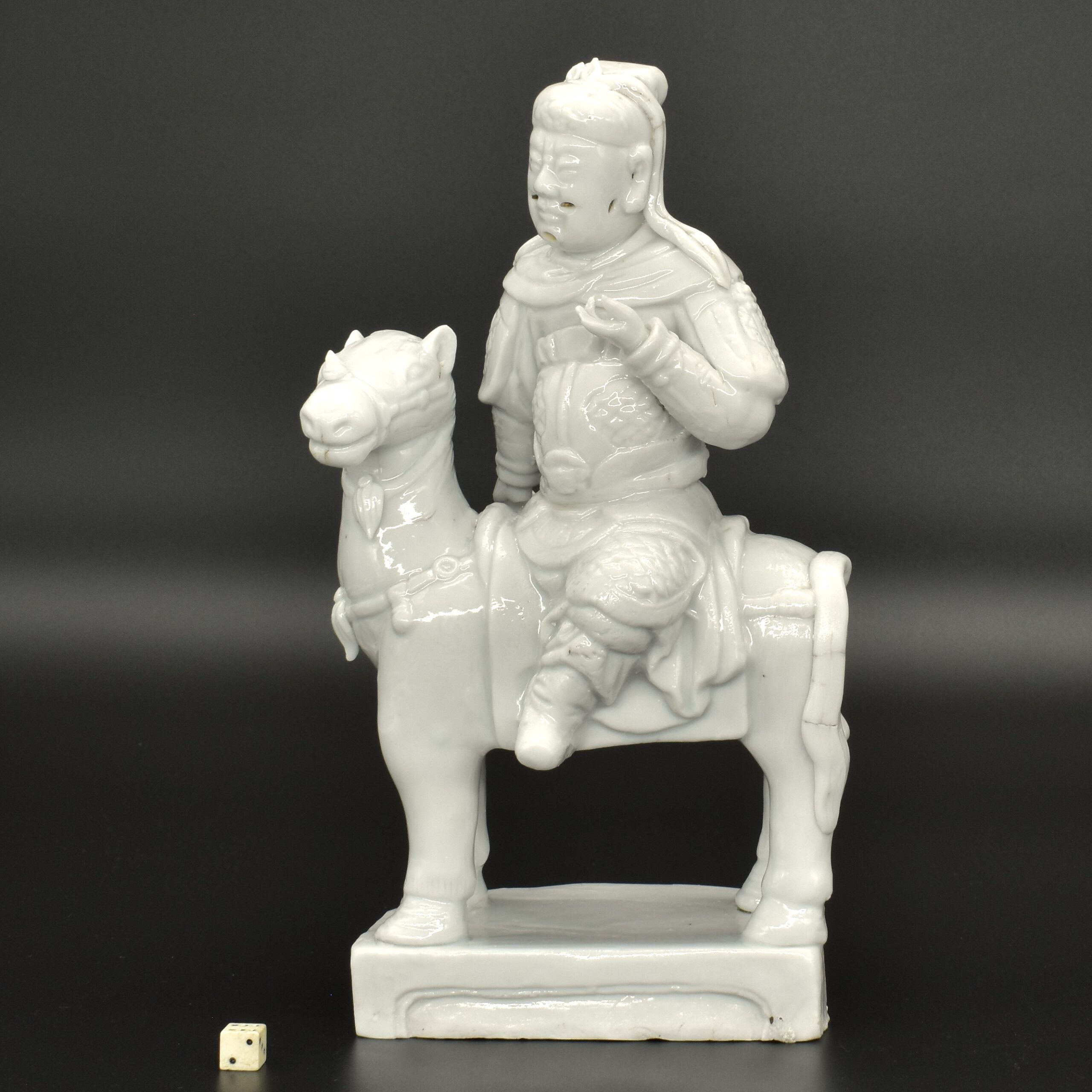 A Kangxi Blanc de Chine Model of Guan Yu Ridding his Horse.