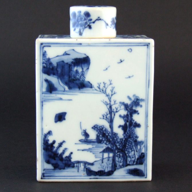 An Early Chinese Export Porcelain Blue and White Tea Canister and Cover, Kangxi c.1690-1710. Both Sides Finely Painted in Rich Cobalt Blue with Two Mountainous Landscapes with Lone Boatman on the Water. The Sides with Flowers Among Jagged Rocks, with Further Flowers on the Top and Cover.SOLD Condition In very good condition. The tea canister with unusually few minute frits to the edges. The cover with a crack to the rim c.17 mm. Size Height : 12.5 cm (5 inches) Provenance N/A Stock number 23927 References For a very similar Kangxi blue and white tea canister and cover see : Chinese and Japanese Ceramics and Works of Art Christie`s Amsterdam 4th of November 2003, lot 73. For a related silver tea canister and cover by Lewis Mettayer dated 1697 now in the Royal Ontario see : Museum Tea Trade & Tea Canister (Antonia Agnew, David Doxey & Felicity Marno, A Loan Exhibition in March 2002) page 14 Figure 7