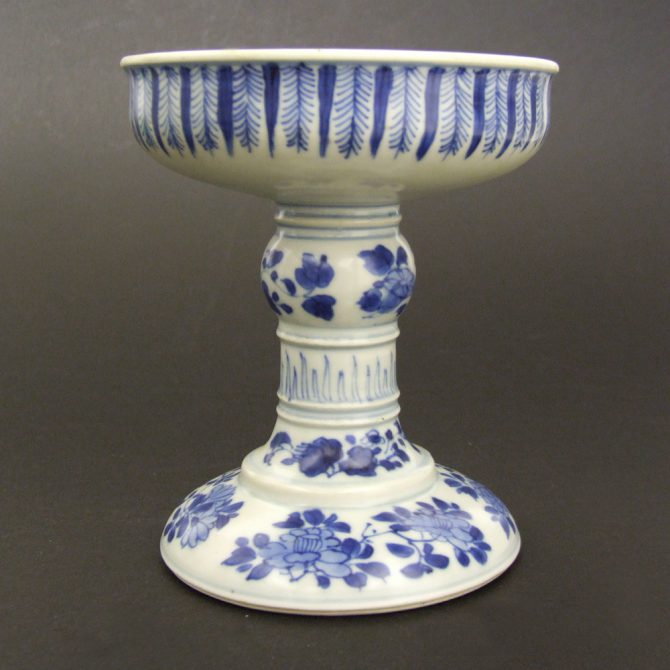 An Unusual Kangxi Blue and White Porcelain Tazza from the Vung Tau Cargo Shipwreck c.1690-1700.SOLD Condition N/A Size Height : 13.6 cm (5 1/2 inches) Provenance Christie`s Amsterdam, The Vung Tau Cargo, Chinese Export Porcelain, April 1992. Label to base lot 18. A Private English Collection of Chinese Blue and White Porcelain. Stock number 22363 References For a very similar Kangxi Porcelain tazza see : Porcelain From The Vung Tau Wreck - The Hallstrom Excavation (By Christian J.A. Jorg and Michael Fletcher.Sun Tree Publishing Ltd, U.K. ISBN 981-04-5208-X.) page 71 figure 62. See `Sold Items` stock 21493, 21490, 21492 for other Vung Tau Cargo Tazza`s.