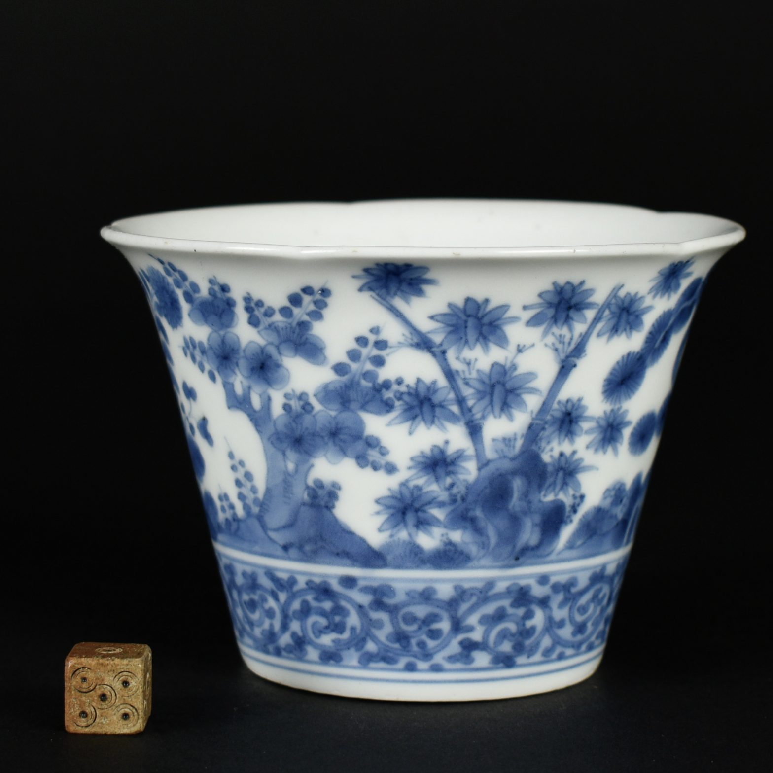 A Blue and White Kakiemon Porcelain Beaker, Japanese, Genroku Period 1688 – 1704, from the Kakiemon kilns. From Welbeck Abbey, the Collection of Margaret Cavendish Bentinck, Duchess of Portland (11 February 1715 – 17 July 1785). The flower shaped form beaker is painted with shôchikubai , The Three friends of Winter, ; pine, prunus and bamboo. There are also flowering chrysanthemum as well as peony growing among a rocky ground. The lower band is of Karakusa. There is a spurious Ming mark to the base, Jiajing 1522-1566. For more information about Margaret Cavendish Bentinck, Duchess of Portland see the information below the photo gallery.SOLD Condition In perfect condition. Size Diameter 10.7 cm to 10.5 cm (4 1/8 inches). Height 7.8 cm (3 inches) Provenance From Welbeck Abbey, this beaker was part of the collection of Margaret Cavendish Bentinck, Duchess of Portland (11 February 1715 – 17 July 1785). The collection of Oliver Impey (1936–2005). R and G McPherson Antiques. The John Drew Collection of Chinese and Japanese Ceramics. Stock number 25155 References Published : Kakiemon, Porcelain from The English Country House (Mark Hinton and Oliver Impey, Exhibition Held at the Ashmolean Museum, Oxford 5th December 1989 - 14th January 1990.) page 62, plate 42, dated to circa 1700. Published : Ko-Imari Porcelain From The Collection of Oliver Impey (Barry Davies Oriental Art Ltd, 1 Davies Street. Exhibition 17th to 27th of June 1997) pages 104-105, plate 53.